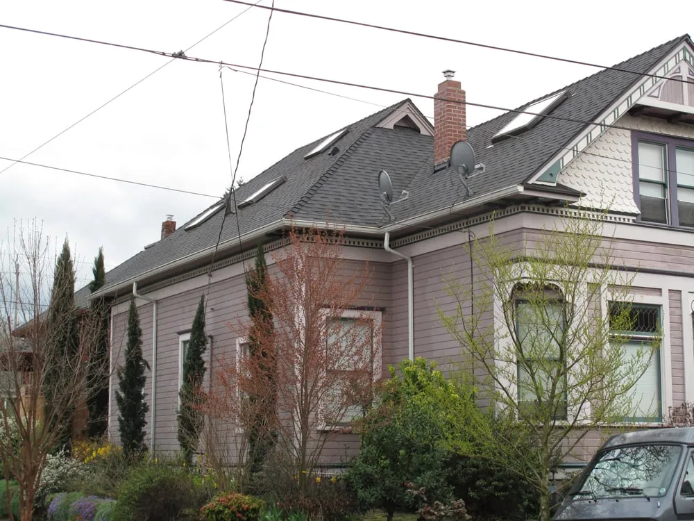 Slide of Tom Leach Roofing