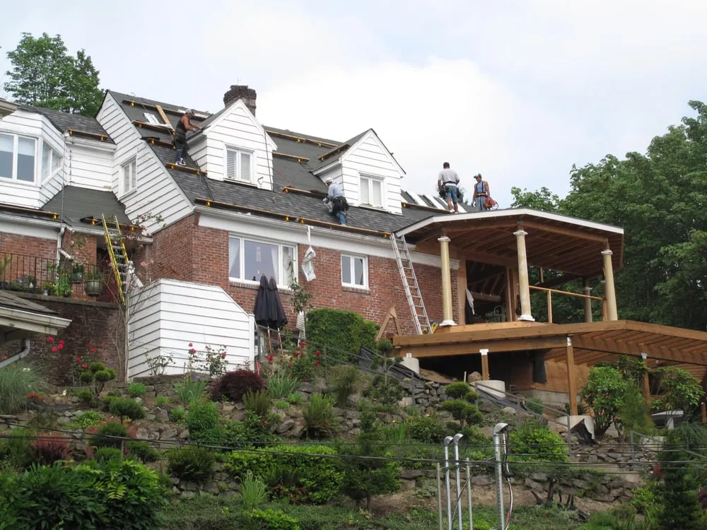 Slide of Tom Leach Roofing