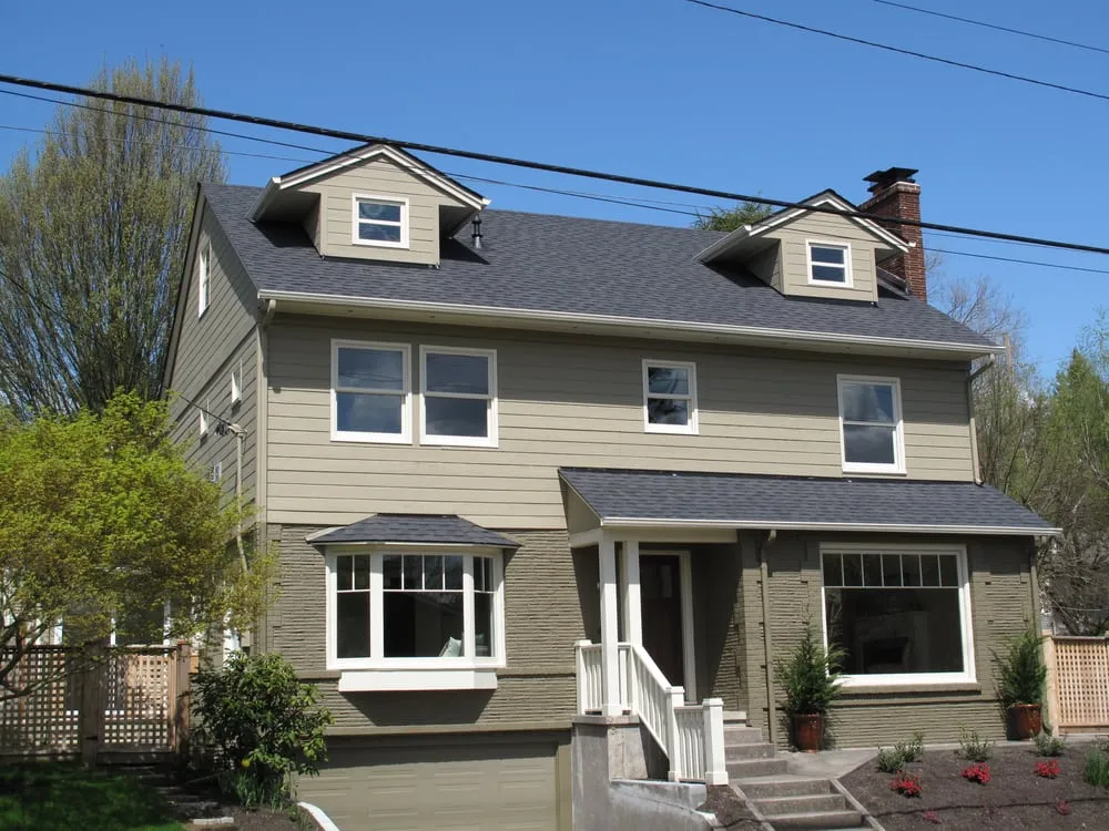 Slide of Tom Leach Roofing