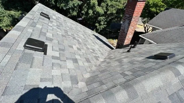 Slide of Tom Leach Roofing