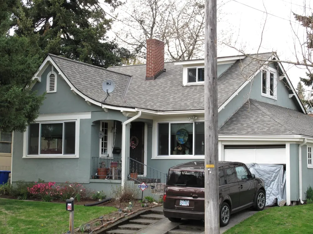 Slide of Tom Leach Roofing