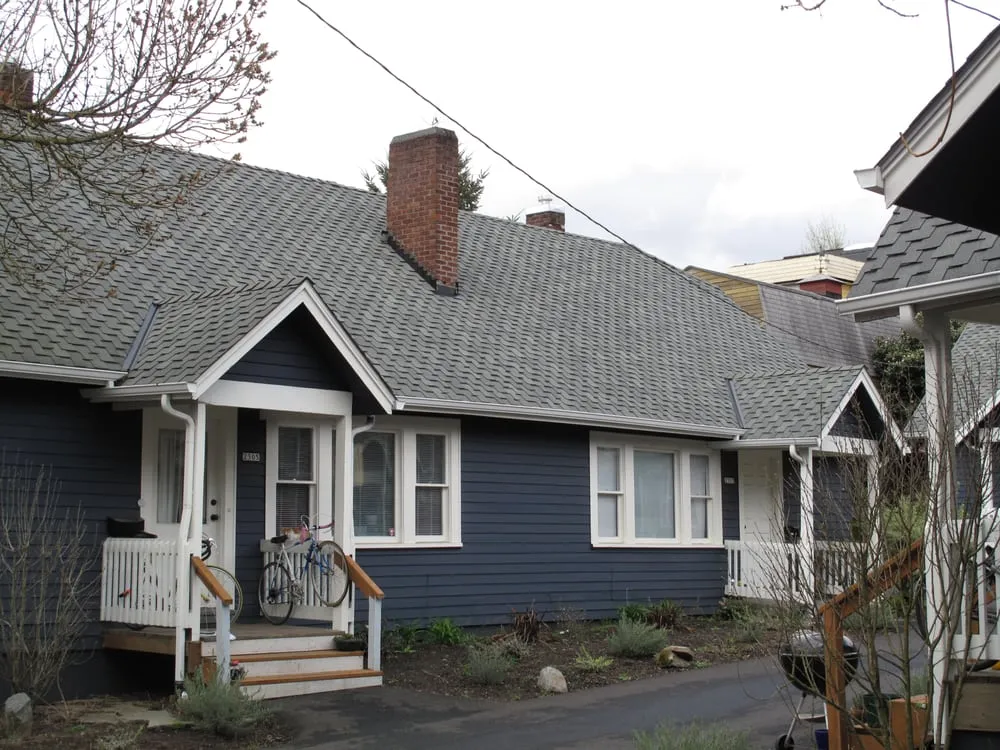 Slide of Tom Leach Roofing