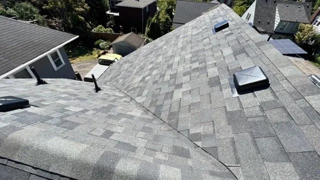 Slide of Tom Leach Roofing