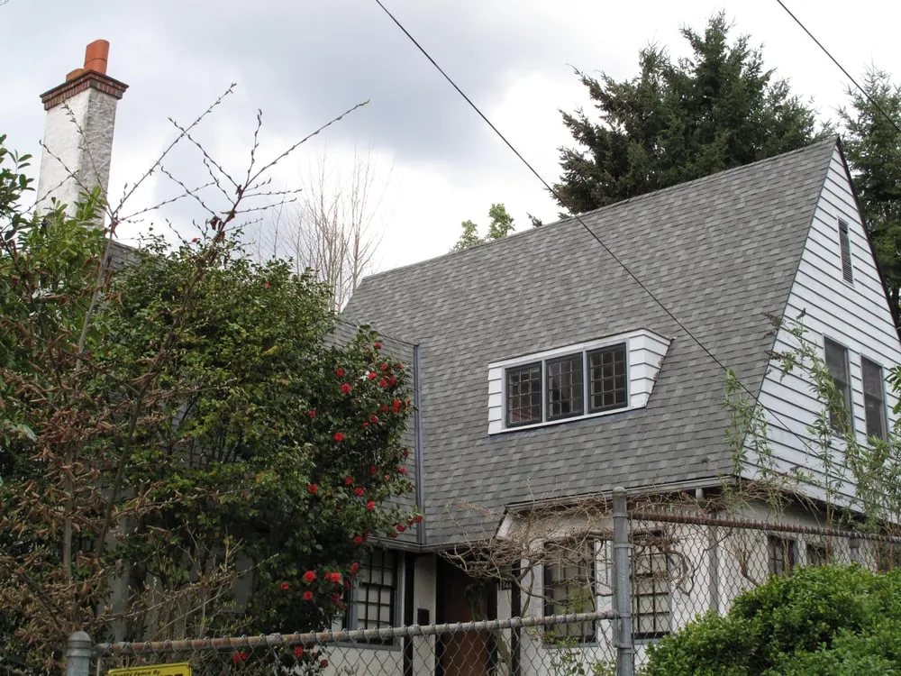 Slide of Tom Leach Roofing