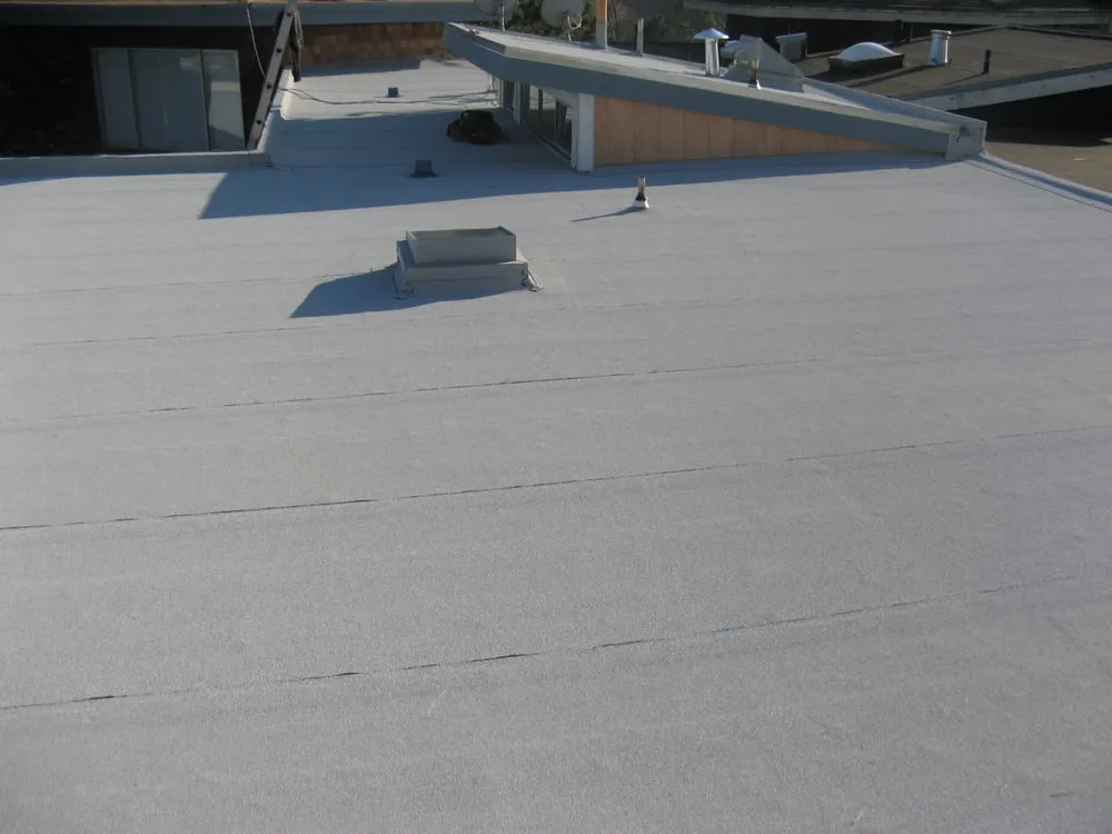 Slide of Tom Lee Roofing