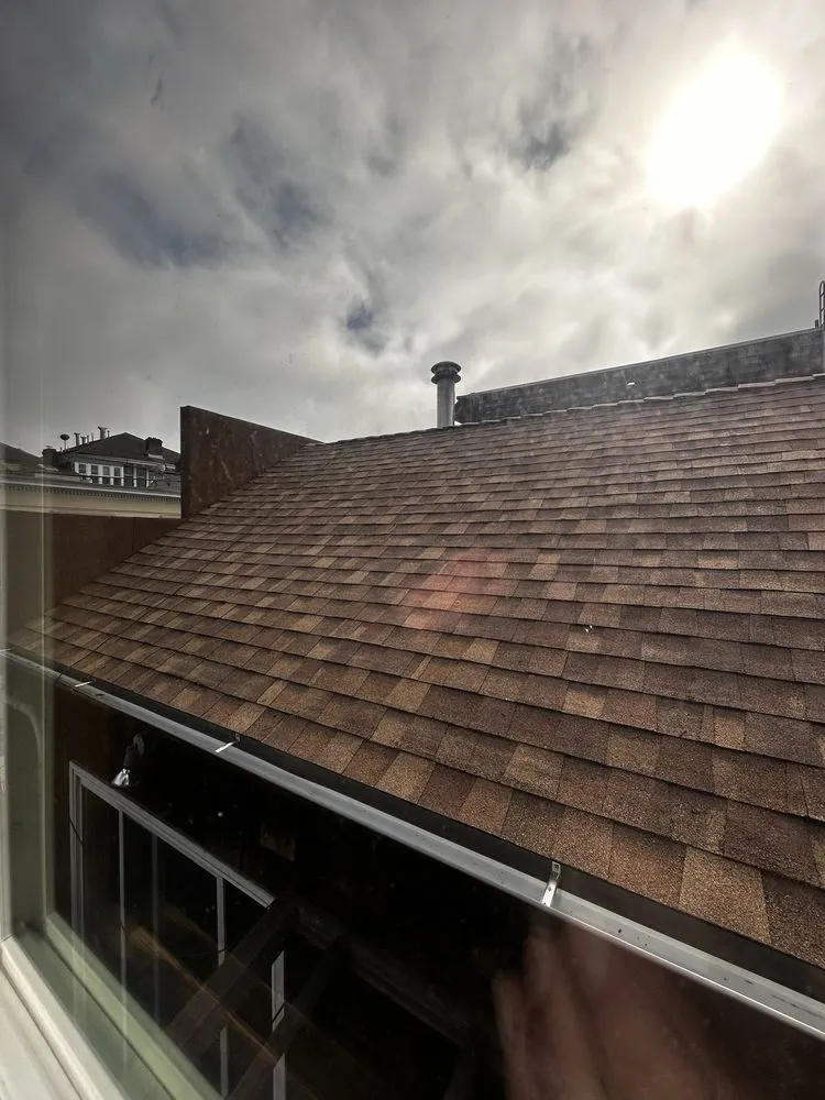 Slide of Tom Lee Roofing