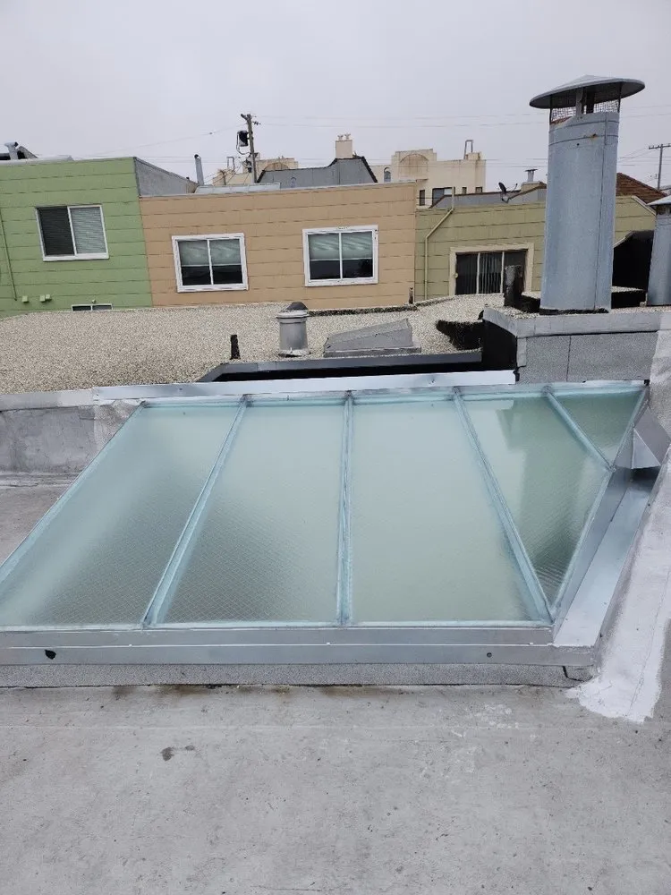 Slide of Tom Lee Roofing