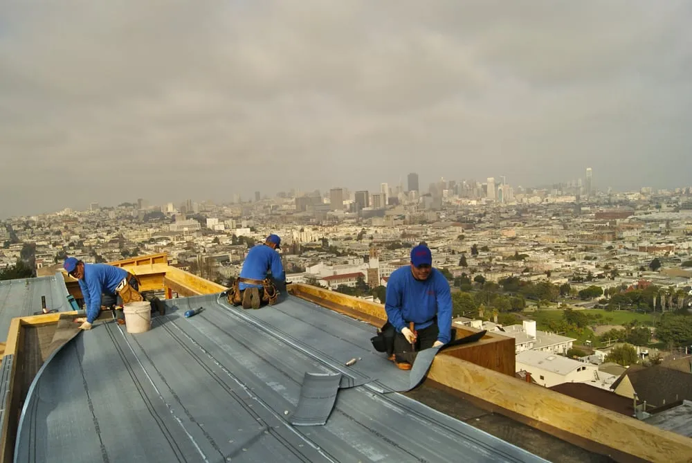 Slide of Tom Lee Roofing