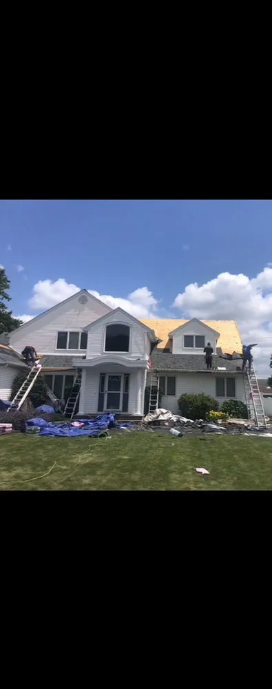 Slide of Tom Mckeon Roofing