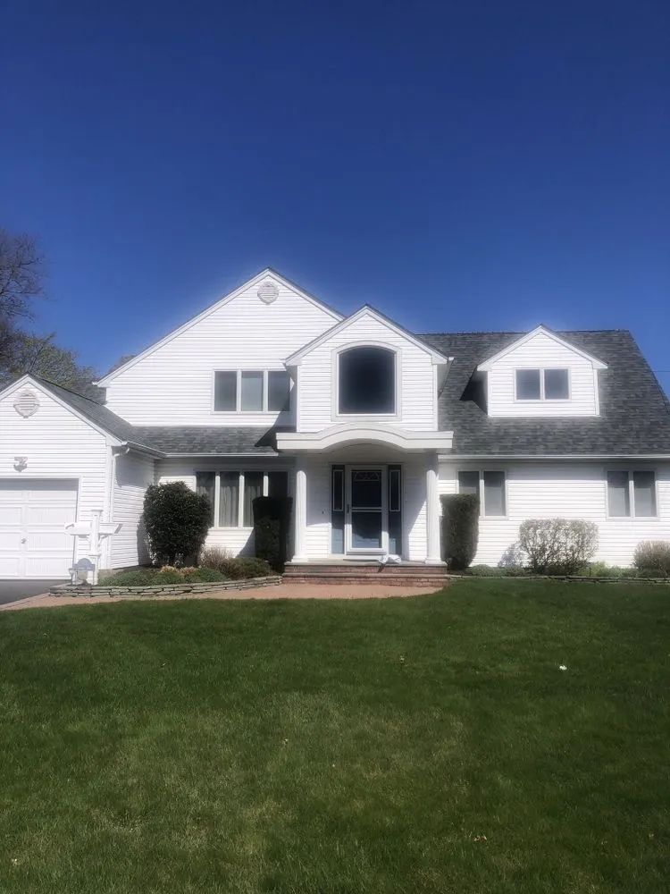 Slide of Tom Mckeon Roofing