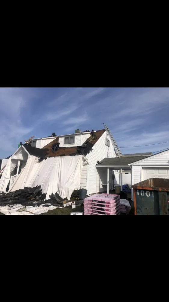 Slide of Tom Mckeon Roofing