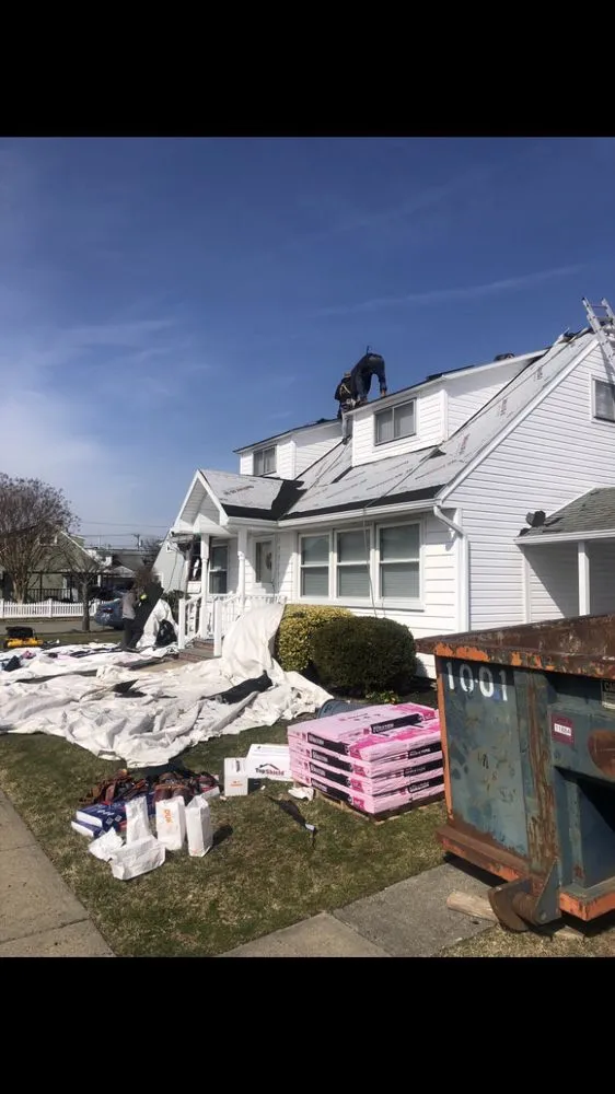 Slide of Tom Mckeon Roofing