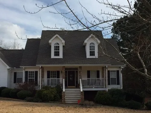 Slide of Tom Perkins Roofing Contractor