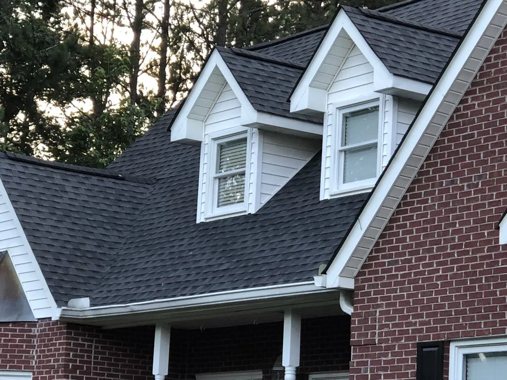 Slide of Tom Perkins Roofing Contractor