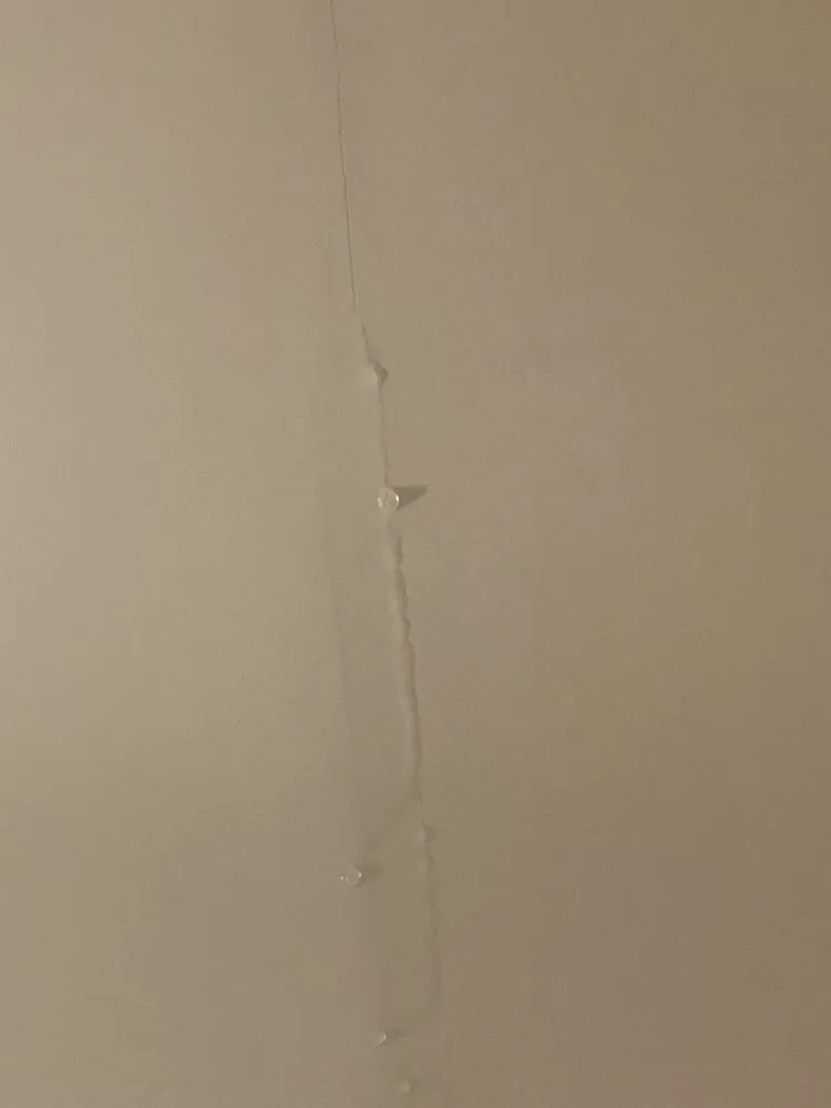 Slide of Tom Roney Roofing