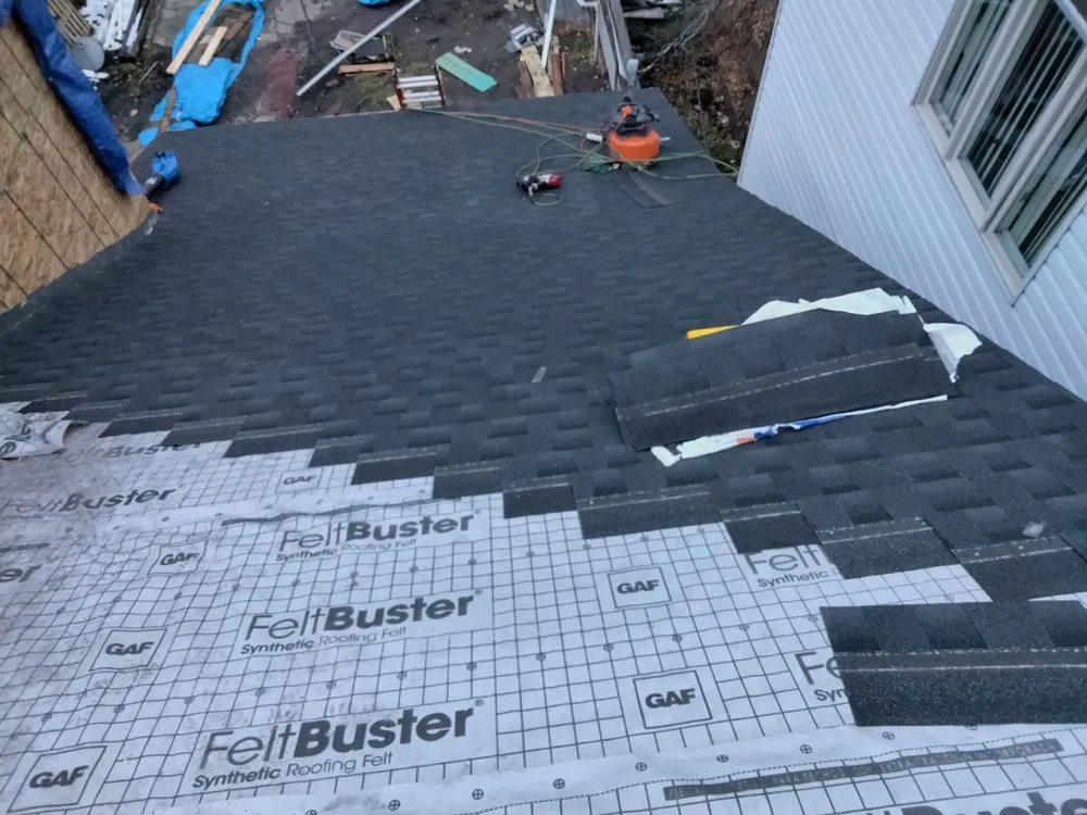 Slide of Tom Severt Roofing