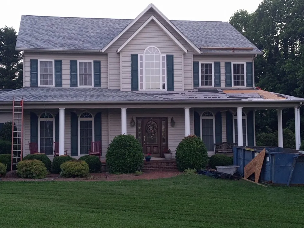 Slide of Tom Severt Roofing