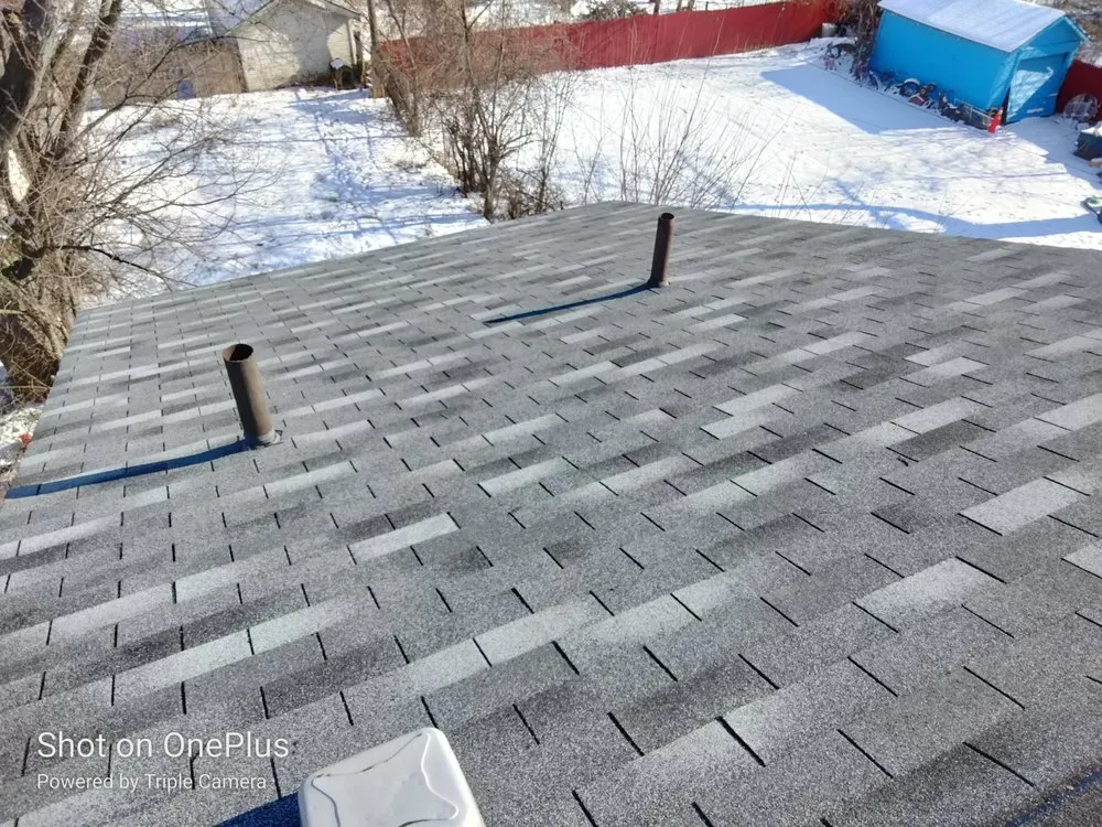 Slide of Tom Severt Roofing