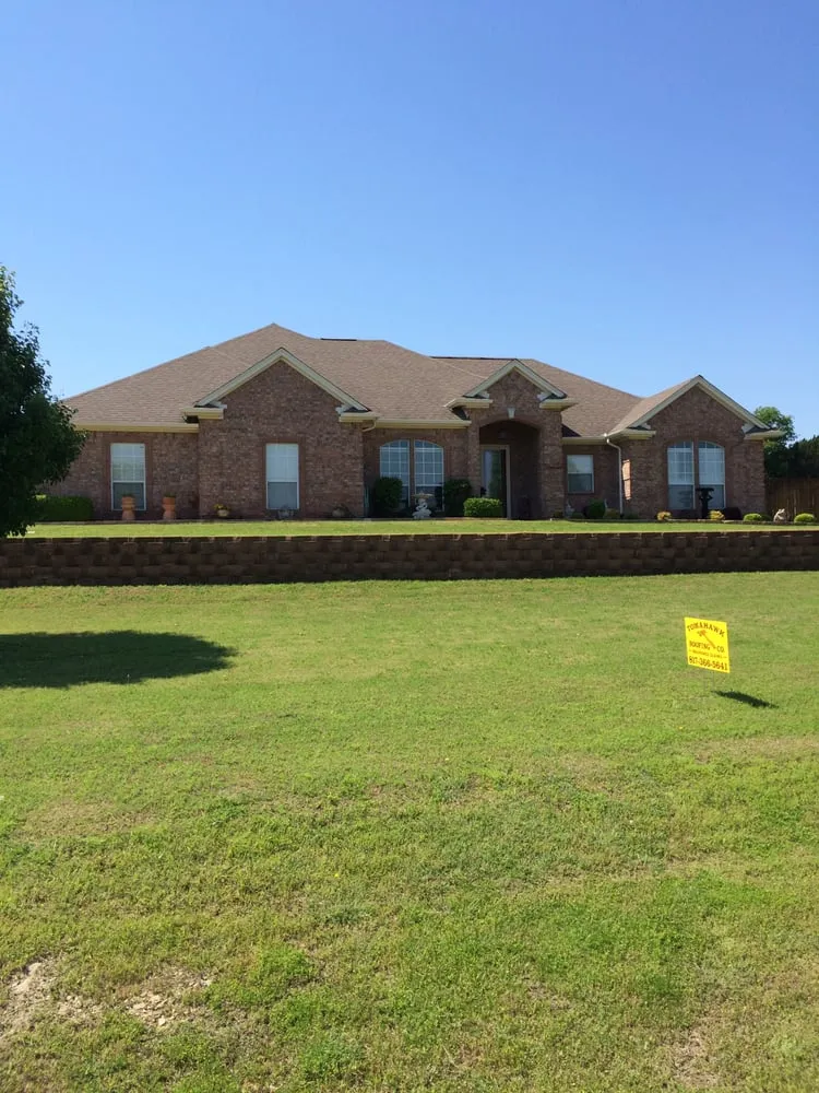 Slide of Tomahawk Roofing Company