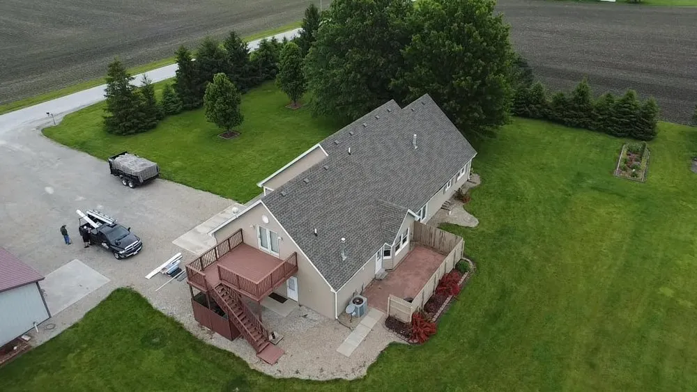 Local storm damage roof repair in Humboldt, IL by Tomahawk Roofing Contractors