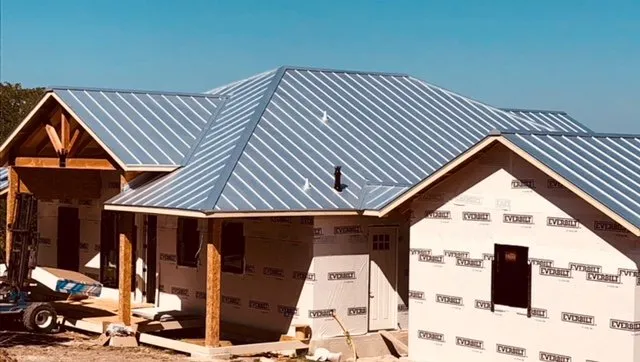 Slide of Tomlin Roofing Professionals