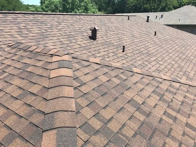 Slide of Tomlin Roofing Professionals