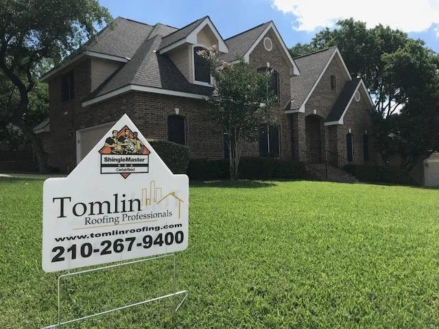 Slide of Tomlin Roofing Professionals