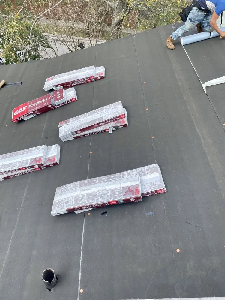 Slide of Tommy Bowman Roofing