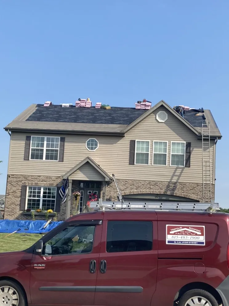 Slide of Tommy Tripolis Roofing