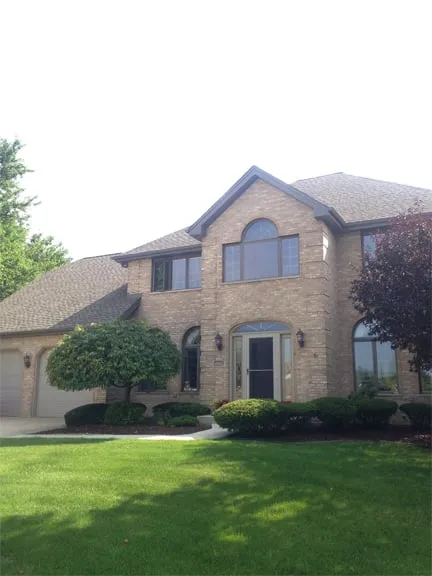 Slide of Tommy Tripolis Roofing