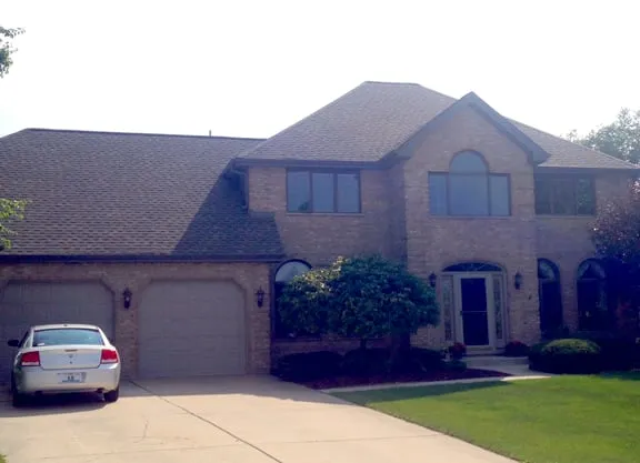 Slide of Tommy Tripolis Roofing