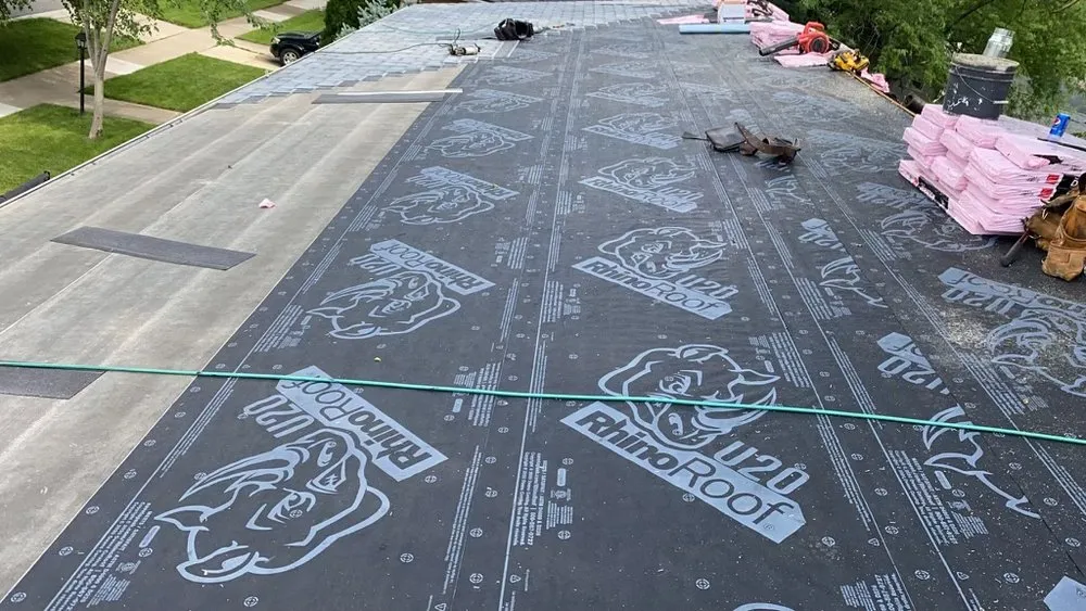 Slide of Tommy Tripolis Roofing