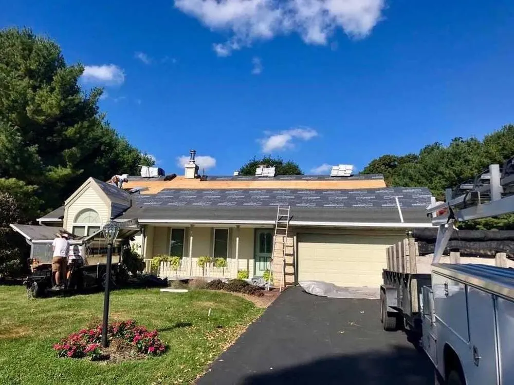 Slide of Tommy Tripolis Roofing