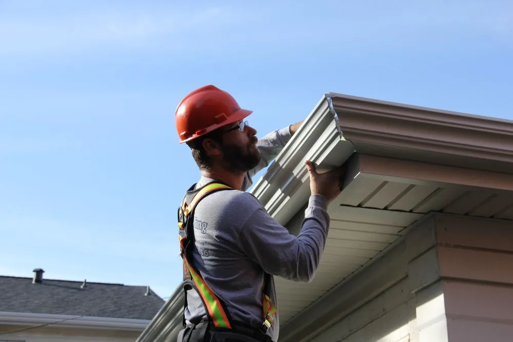 Slide of Tommy's Roof & Gutter Cleaning Service