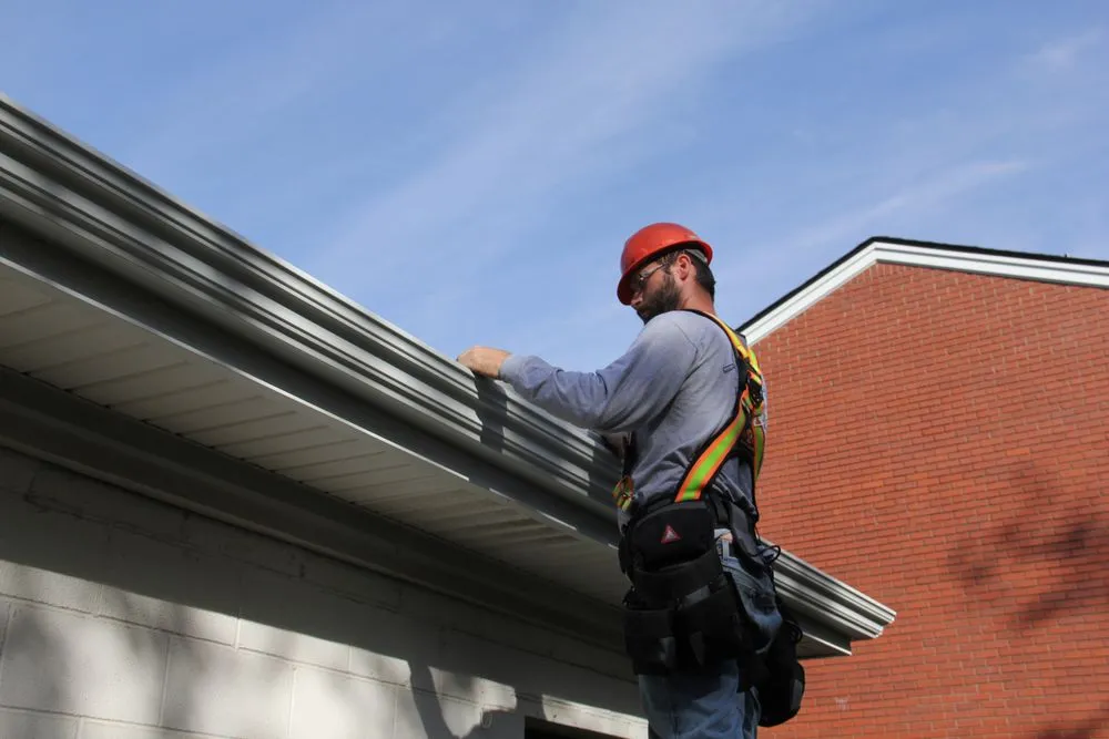 Slide of Tommy's Roof & Gutter Cleaning Service