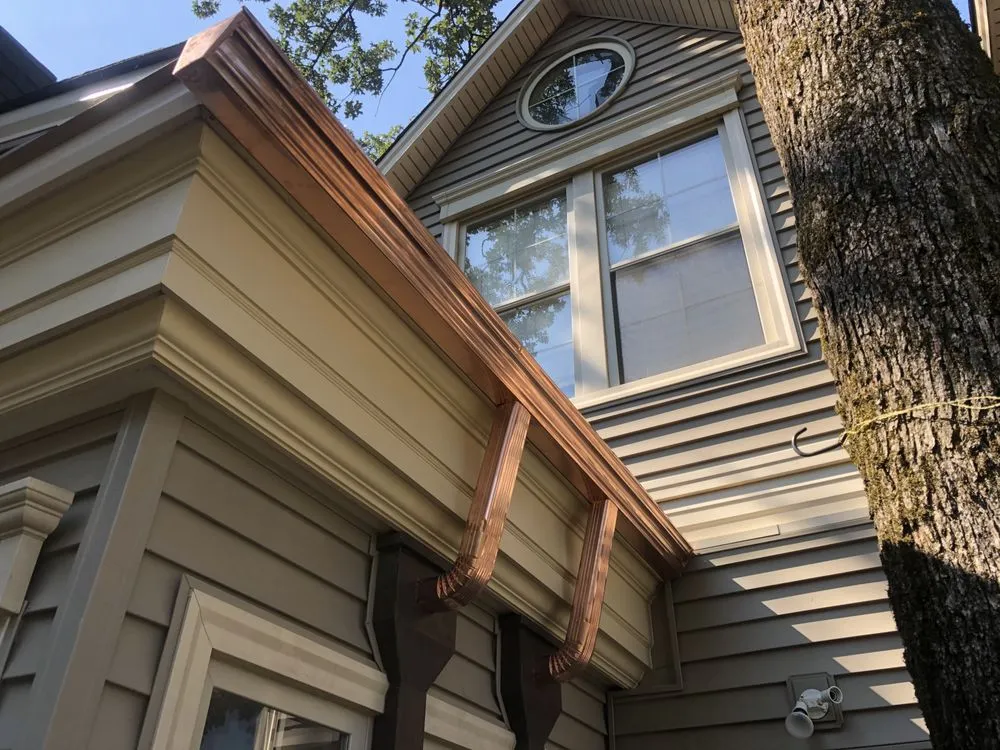 Slide of Tommy's Roof & Gutter Cleaning Service