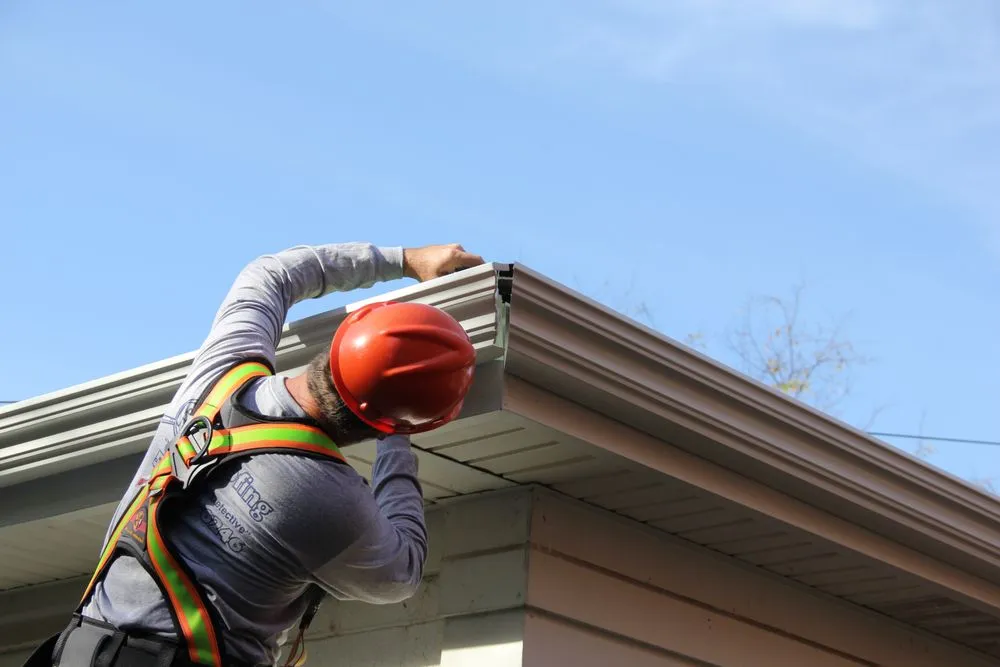 Slide of Tommy's Roof & Gutter Cleaning Service