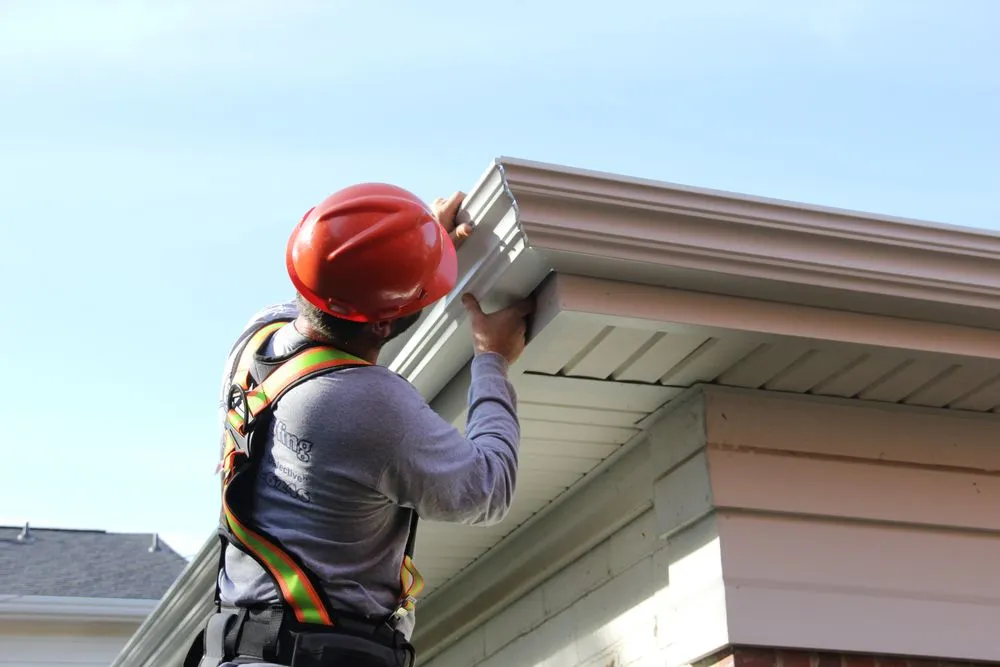 Slide of Tommy's Roof & Gutter Cleaning Service
