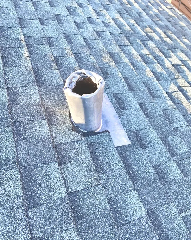 Slide of Tommys Roofing