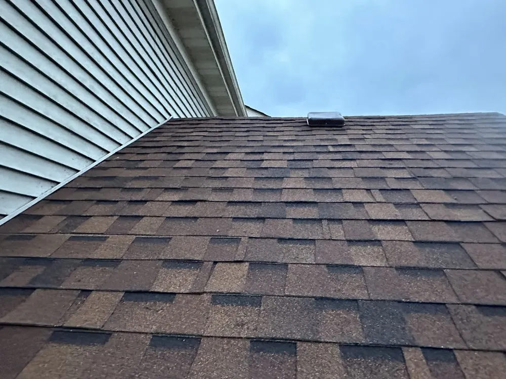 Slide of Tommys Roofing