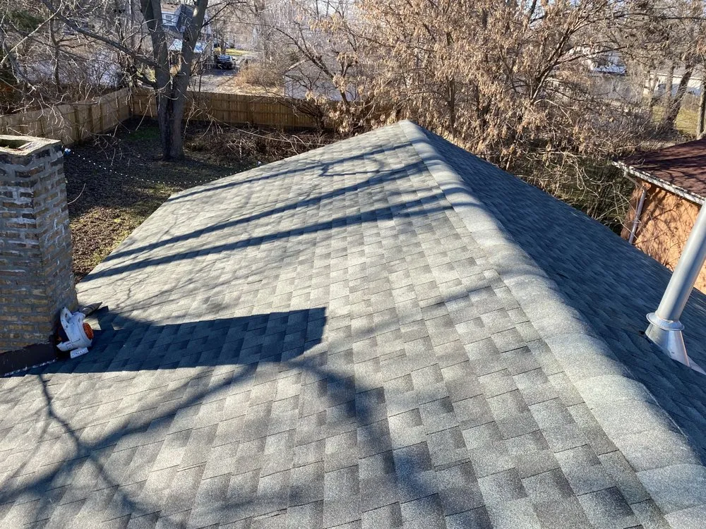 Slide of Tommys Roofing