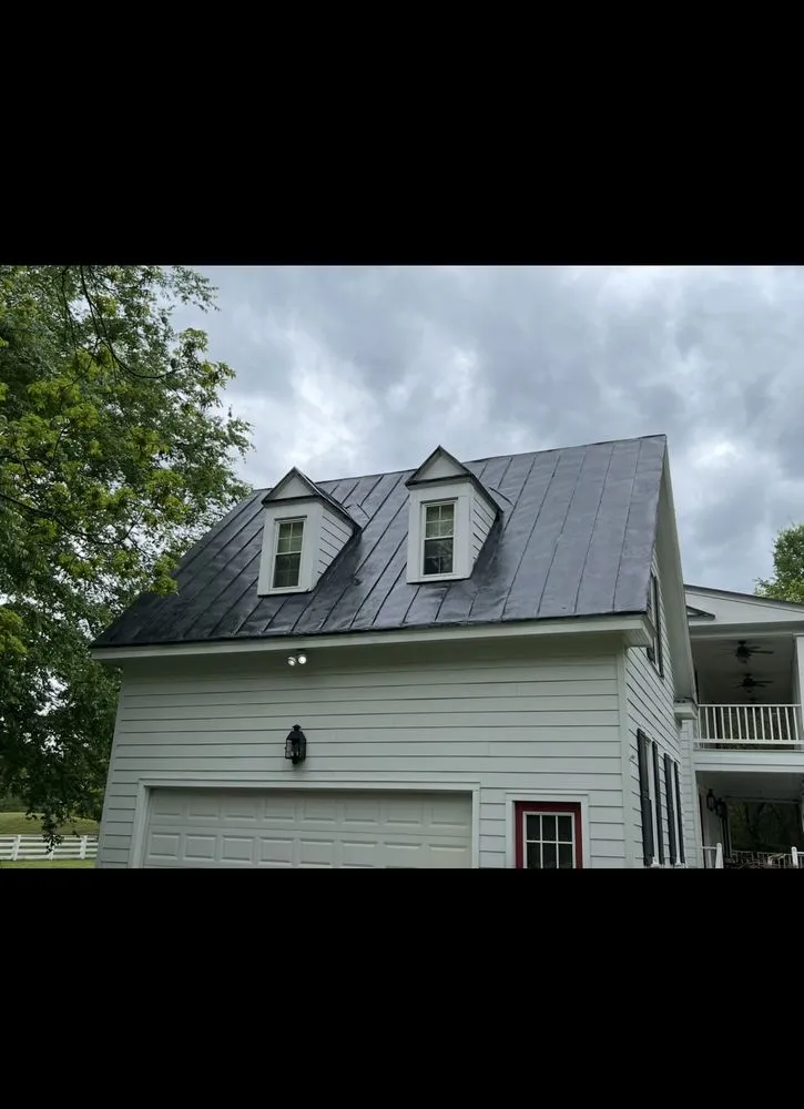 Slide of Tom’s Painting and Roofing