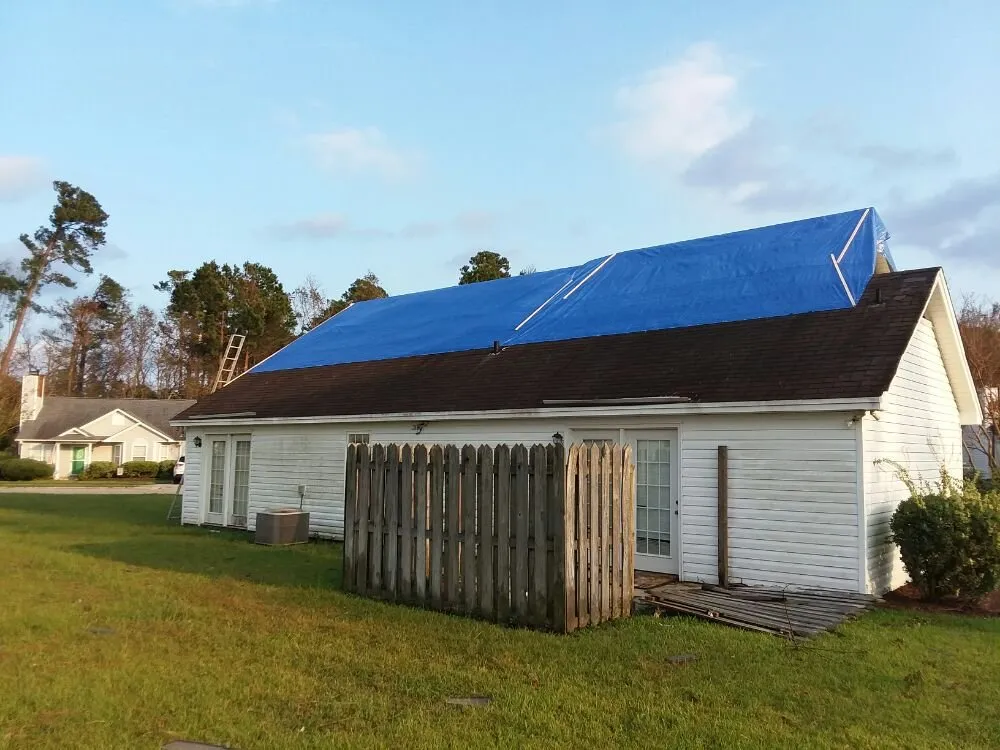 Slide of Tom's Professional Painting, Roofing & Waterproofing Services