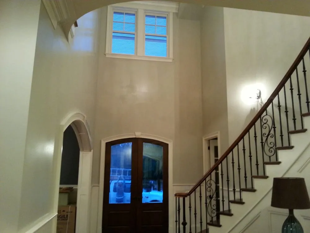 Slide of Tom's Professional Painting, Roofing & Waterproofing Services