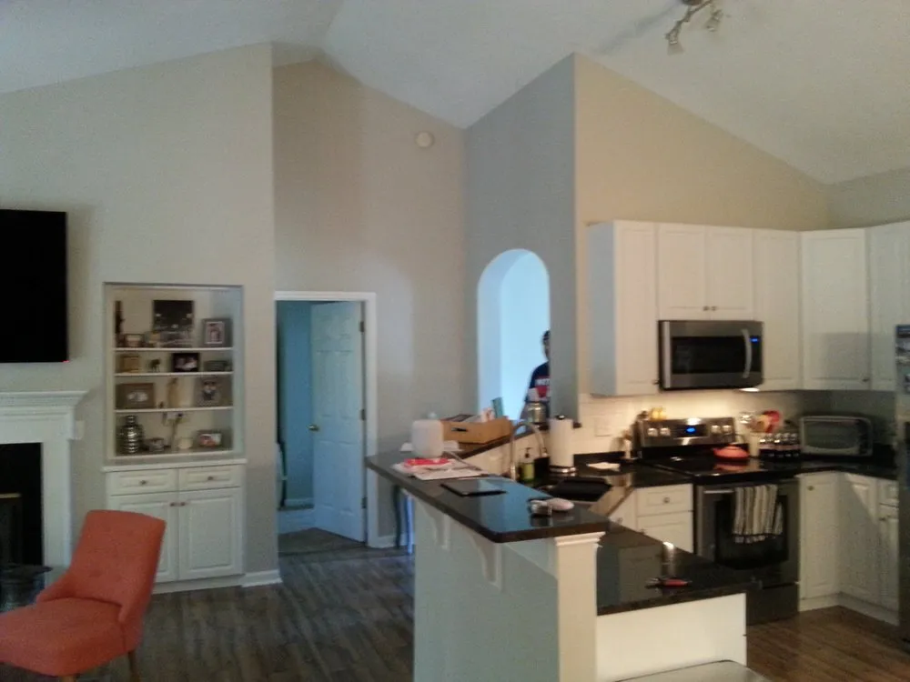 Slide of Tom's Professional Painting, Roofing & Waterproofing Services