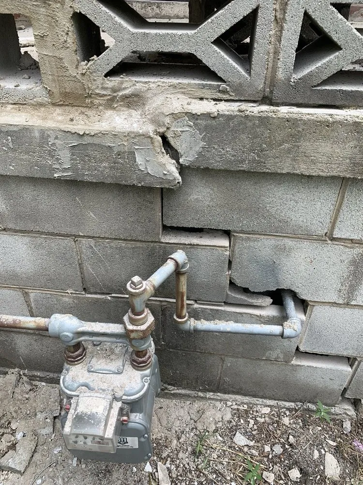 Slide of Tom's Roofing and Remodeling