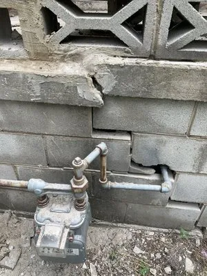 Tom's Roofing and Remodeling Logo