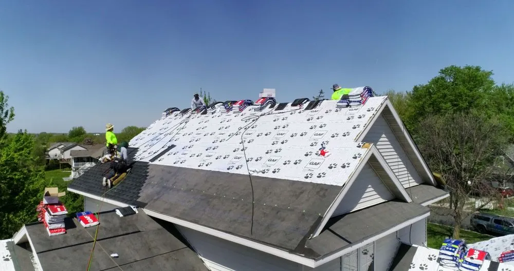 Slide of Tonka Roofing