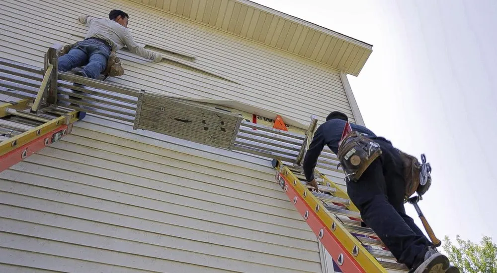 Slide of Tonka Roofing