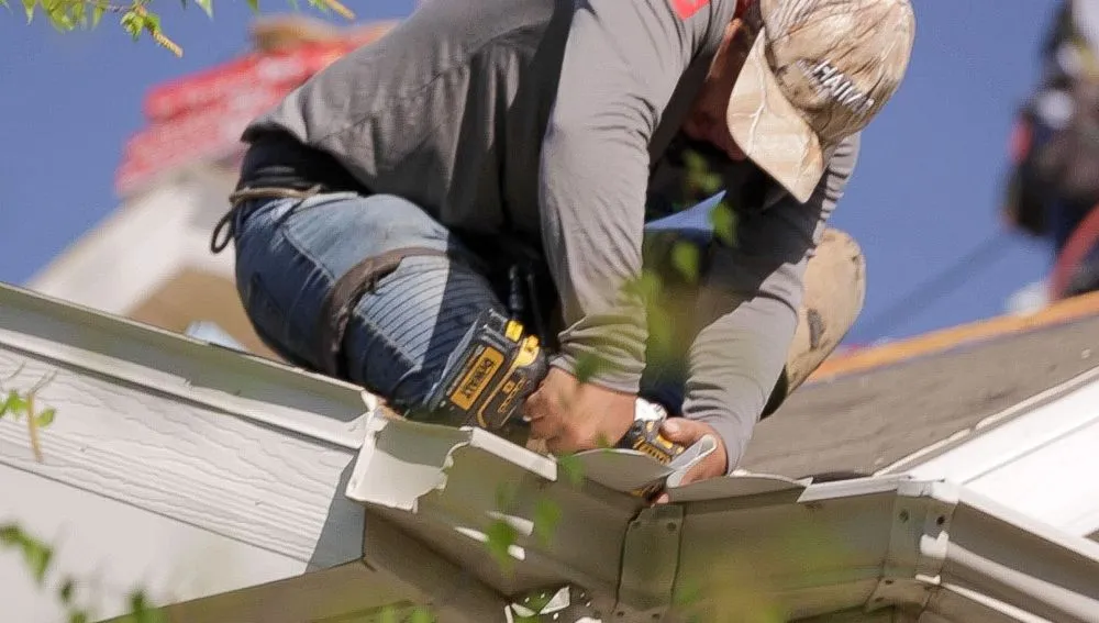 Slide of Tonka Roofing